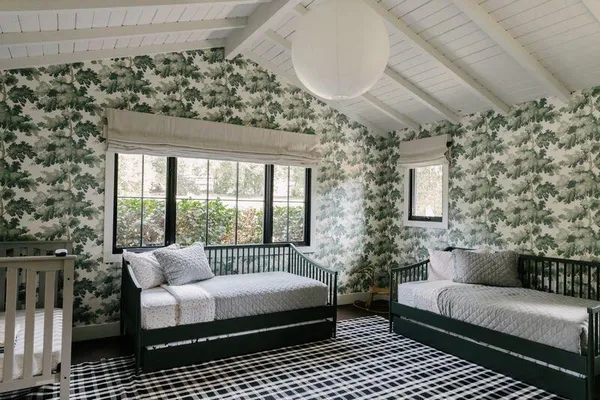 a balcony with furniture and a potted plant