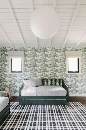 a front view of a house with a rug