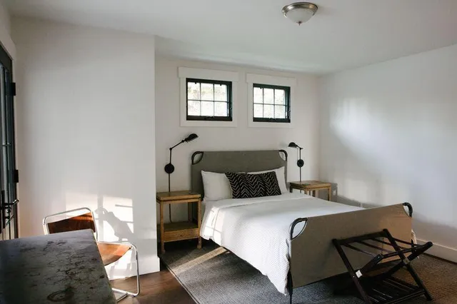 a living room with stainless steel appliances kitchen island granite countertop furniture and a kitchen view