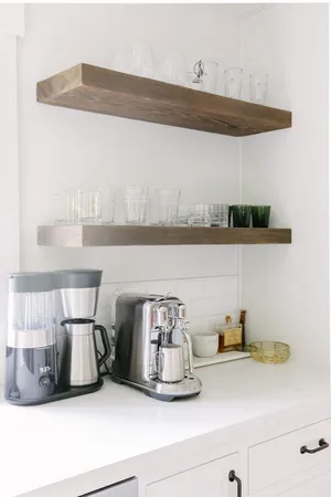 a kitchen with a stove and cabinets