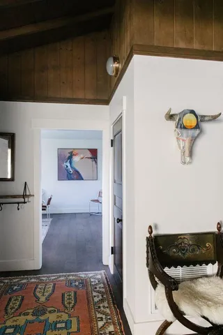 a workspace with furniture and window