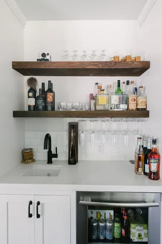 a kitchen with a stove and cabinets