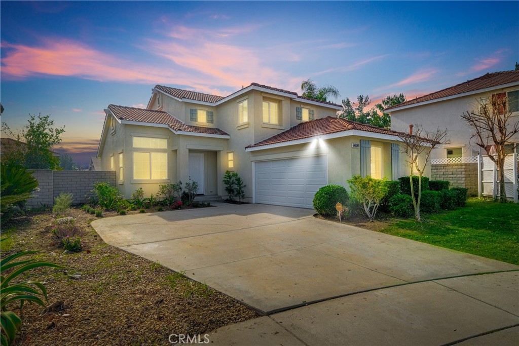 13113 Gabay Court Rancho Cucamonga, CA 91739 - Photo 1 of 1 a front view of a house with garden