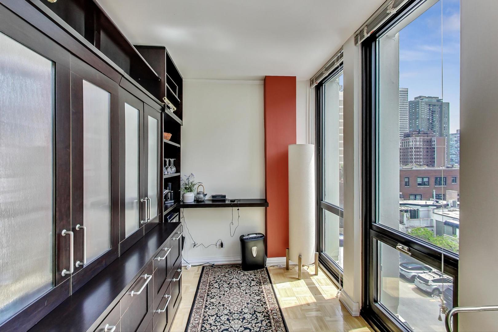 1 East Scott Street, Unit 709 Chicago, IL 60610 - Photo 18 of 31 a view of a living room and a balcony