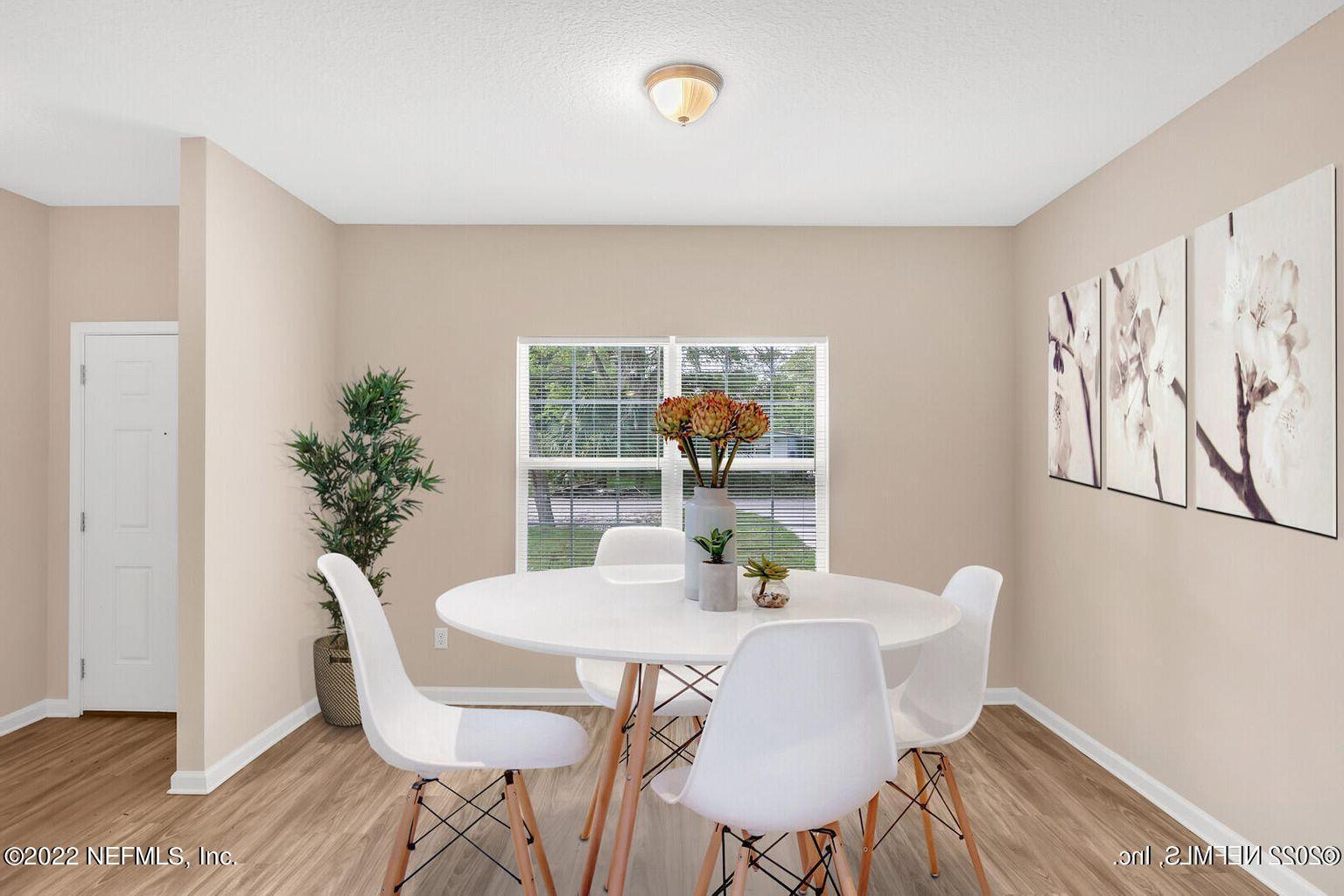 7276 Ridgeway Road North Jacksonville, FL 32244 - Photo 11 of 26 a dining room with furniture and window