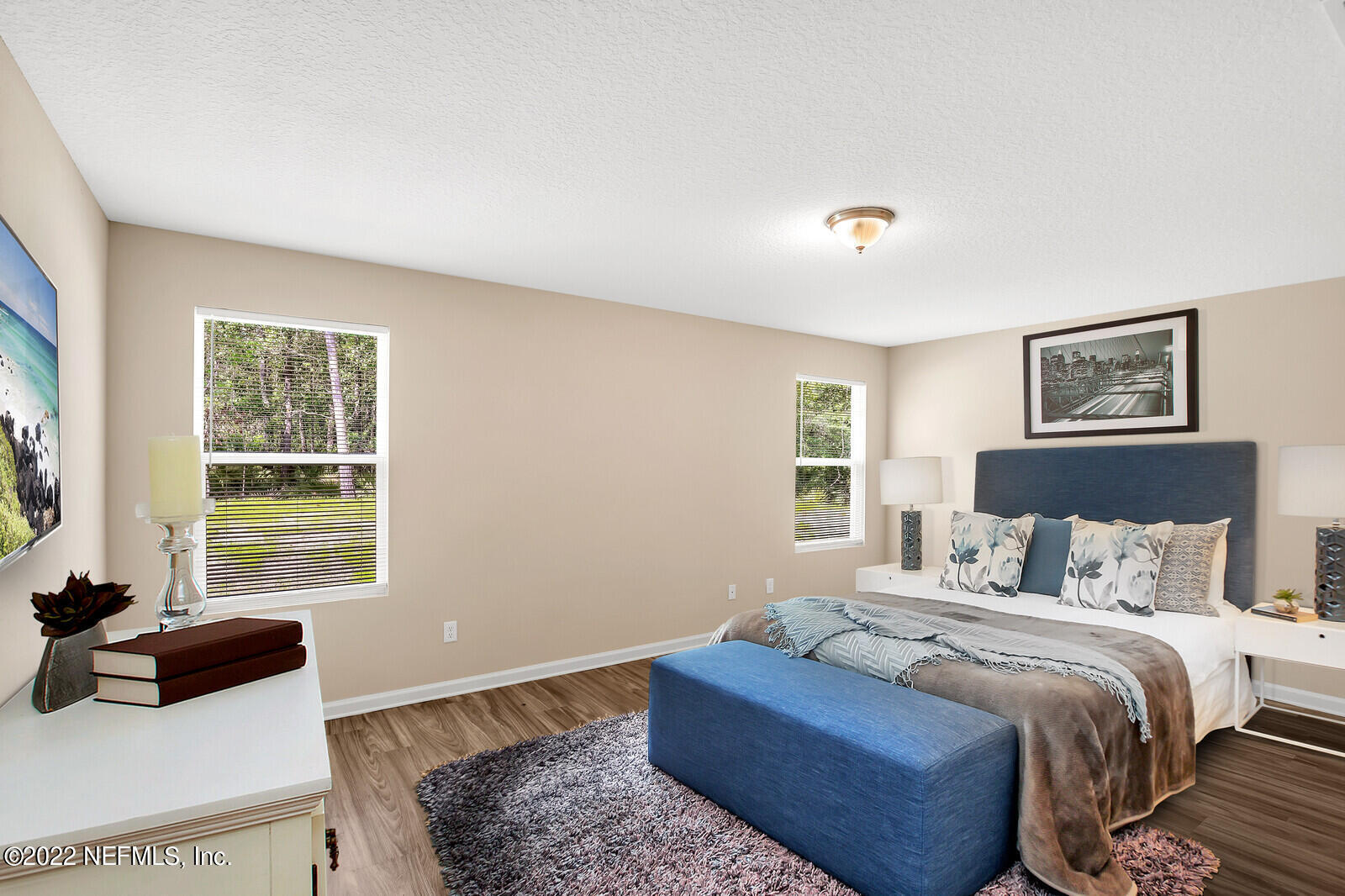 7276 Ridgeway Road North Jacksonville, FL 32244 - Photo 13 of 26 a bedroom with a bed and a window