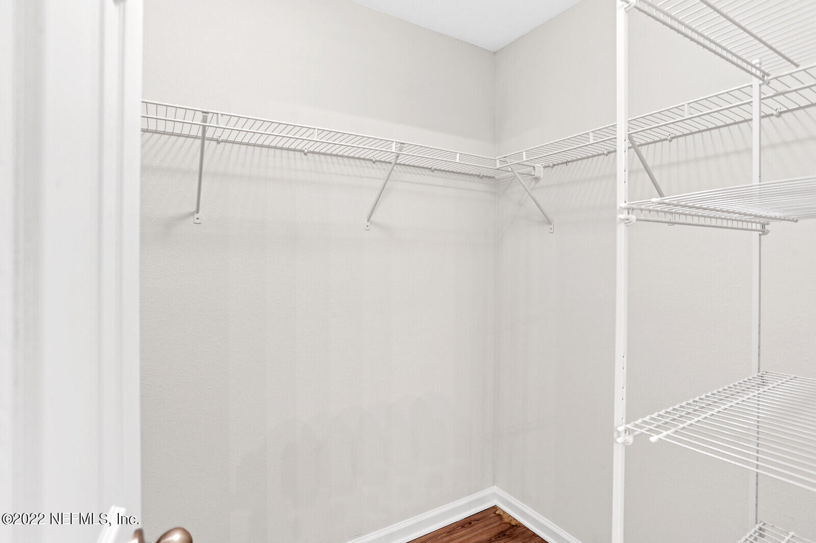 7276 Ridgeway Road North Jacksonville, FL 32244 - Photo 16 of 26 a view of a room with racks on the wall