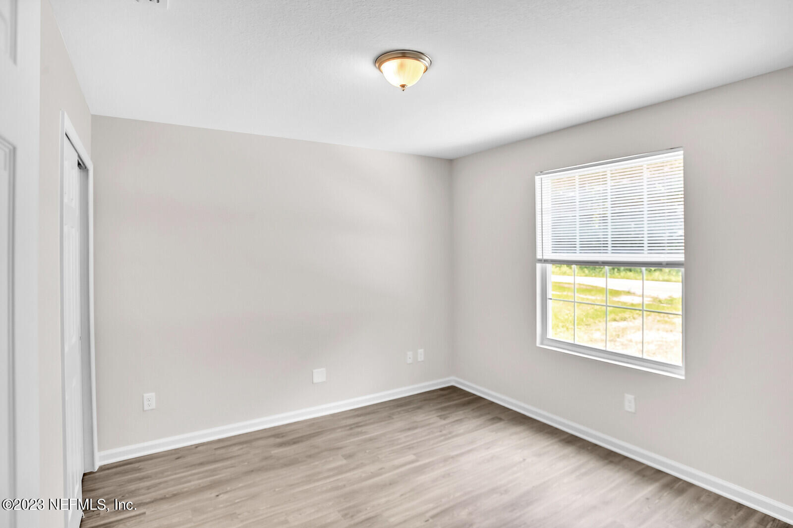 7276 Ridgeway Road North Jacksonville, FL 32244 - Photo 18 of 26 a view of a room that has a window in it