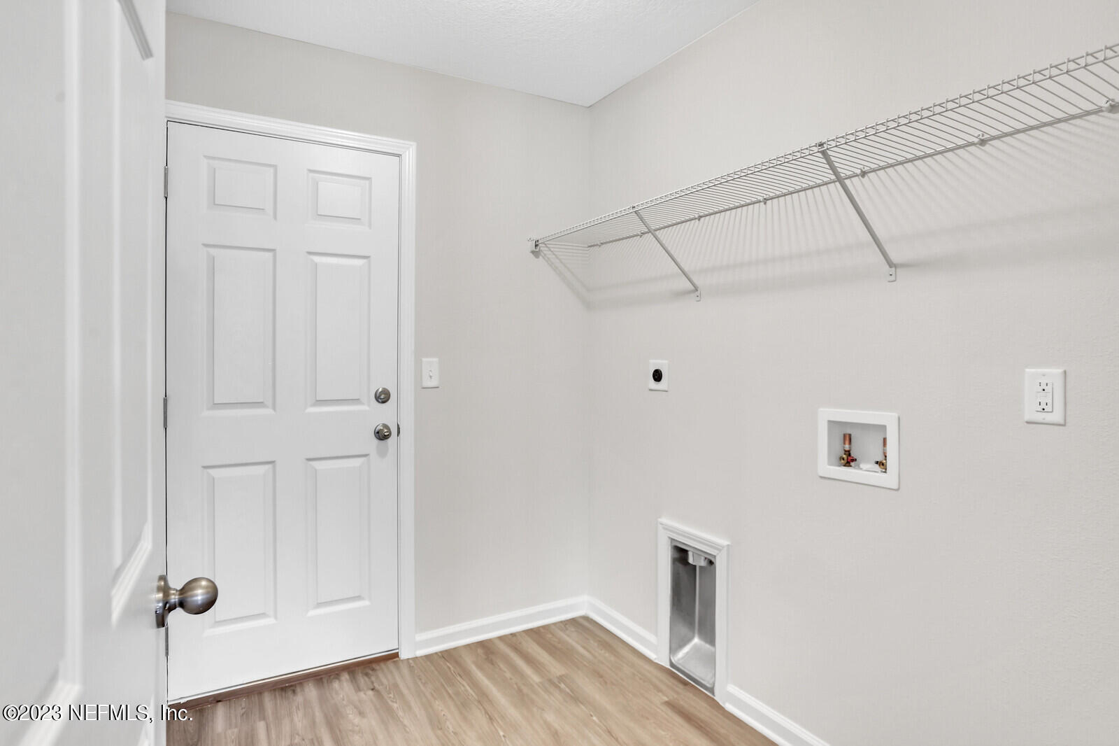 7276 Ridgeway Road North Jacksonville, FL 32244 - Photo 25 of 26 a view of a livingroom with wooden floor