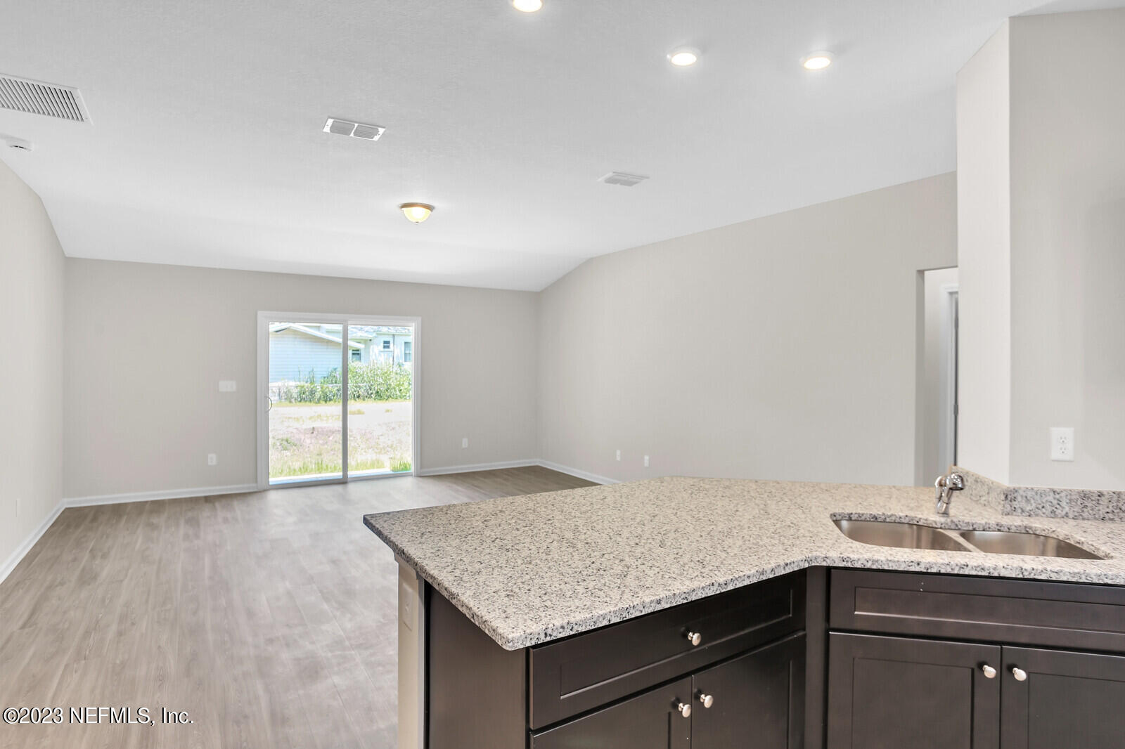 7276 Ridgeway Road North Jacksonville, FL 32244 - Photo 4 of 26 a bathroom with a granite countertop sink a toilet and a mirror