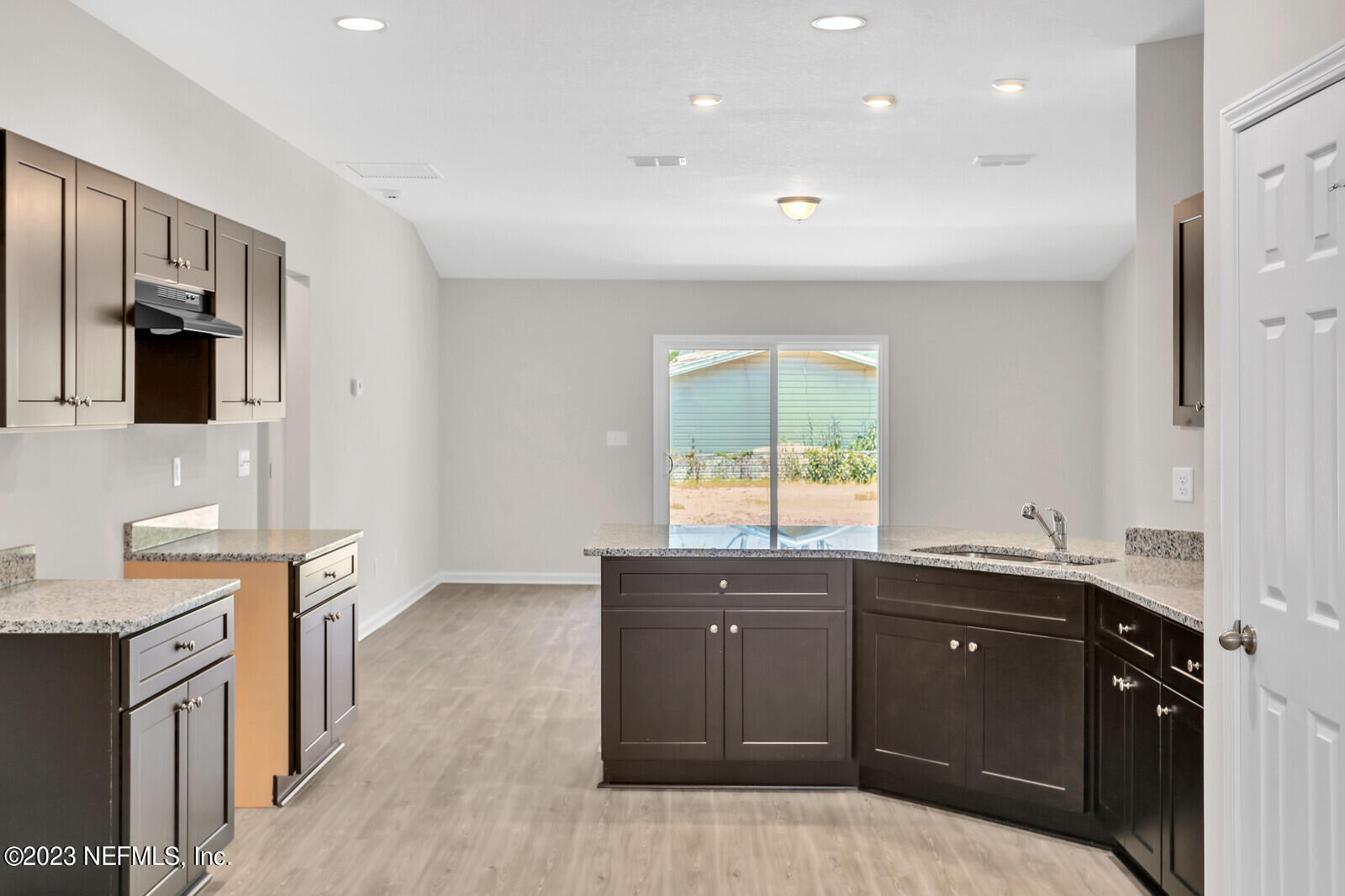 7276 Ridgeway Road North Jacksonville, FL 32244 - Photo 8 of 26 a kitchen with a sink and a stove top oven