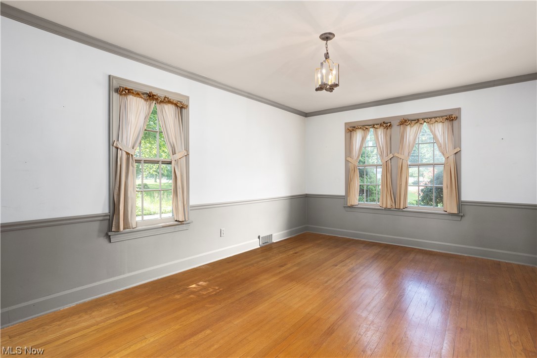 1920 Grafton Road Elyria, OH 44035 - Photo 16 of 35 Hardwood floors continue in the first floor master bedroom
