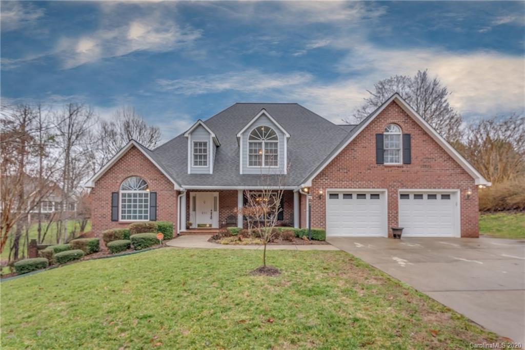 231 Ridgeview Drive Rutherfordton, NC 28139 - Photo 1 of 38 a front view of a house with garden