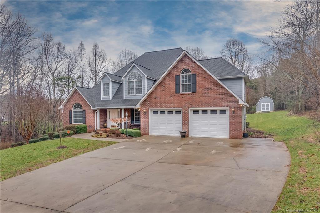 231 Ridgeview Drive Rutherfordton, NC 28139 - Photo 4 of 38 a front view of a house with a yard and garage