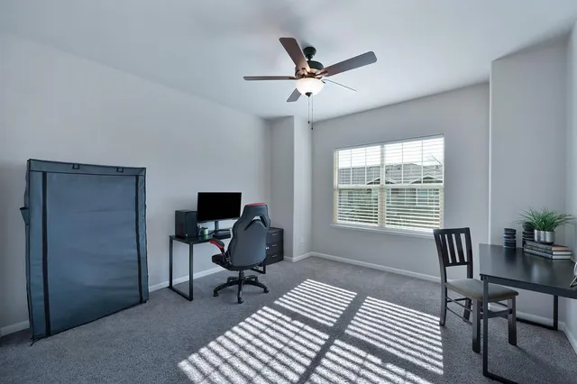 a outdoor space with a couch and chairs