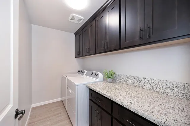 a backyard of a house with fire pit and couch