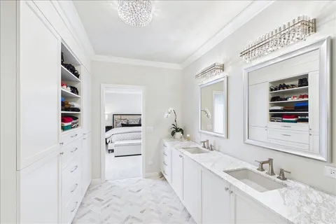 a bathroom with a sink a vanity and a bathtub
