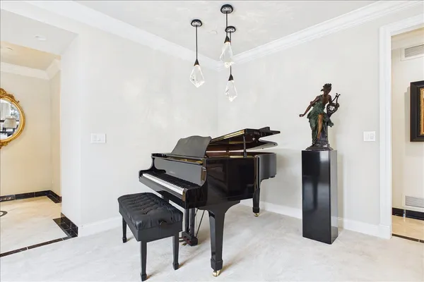 a kitchen with granite countertop a sink stove and refrigerator