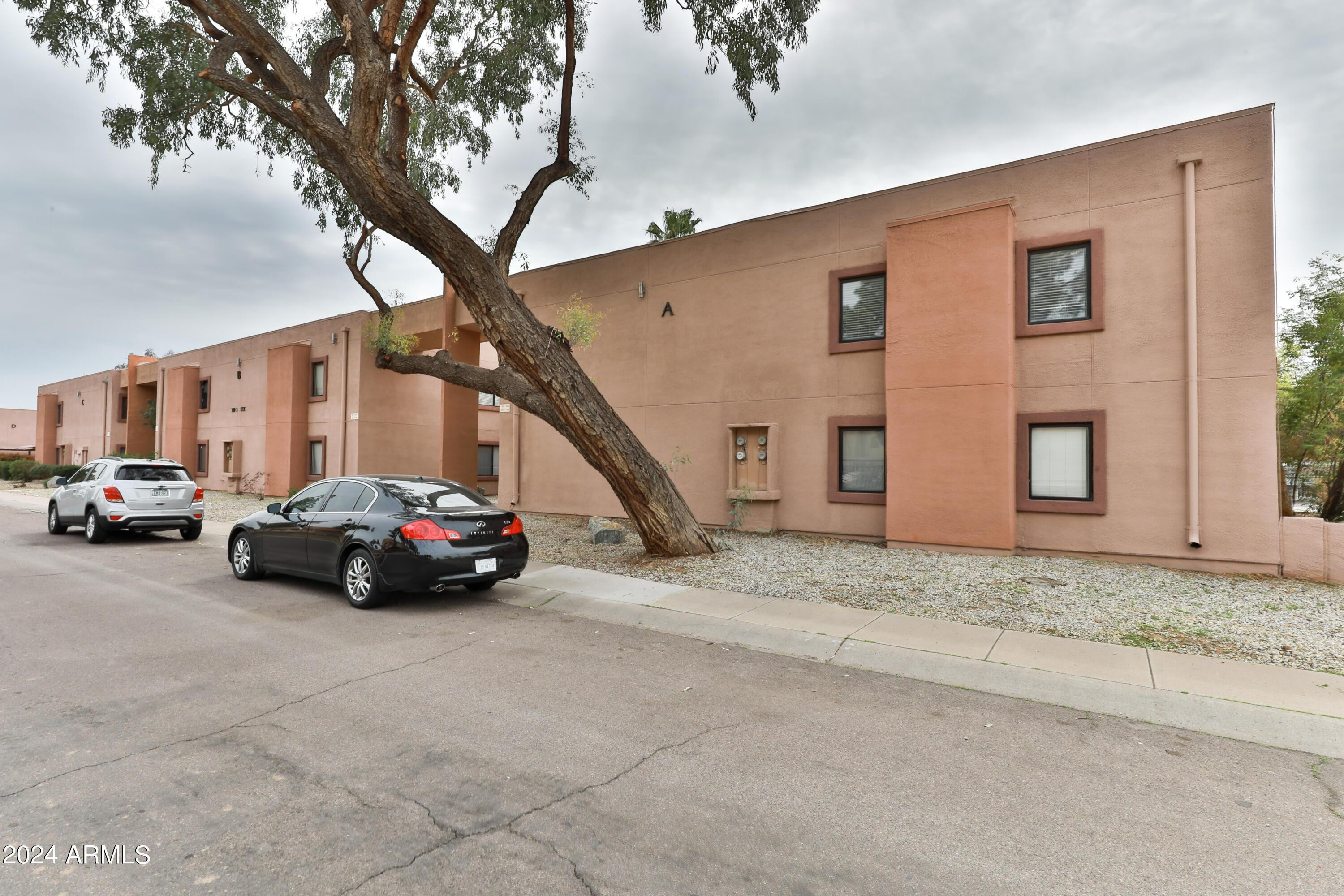 330 South Beck Avenue, Unit 201 Tempe, AZ 85281 - Photo 1 of 17 a car parked in front of a house