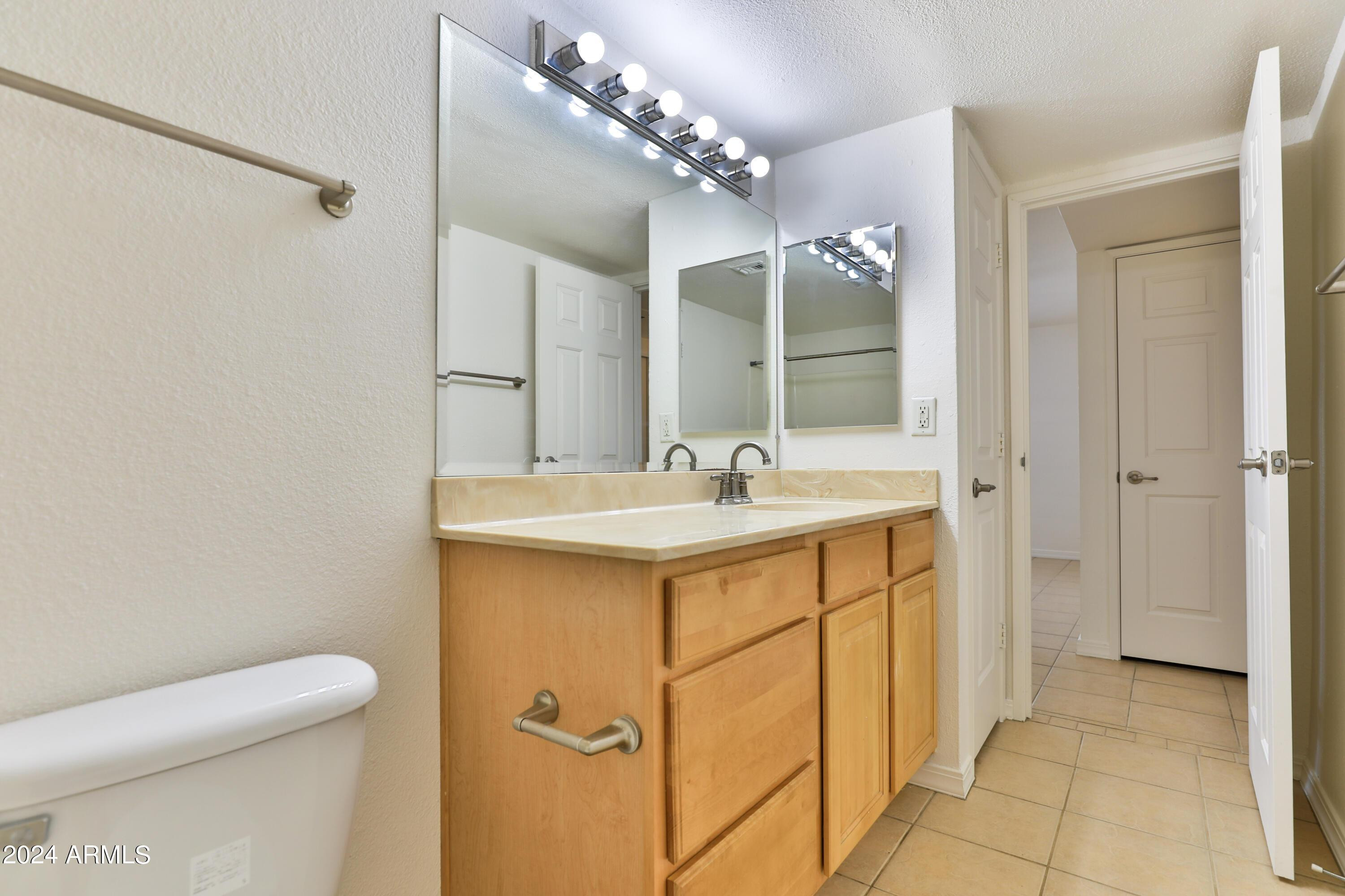 330 South Beck Avenue, Unit 201 Tempe, AZ 85281 - Photo 13 of 17 a bathroom with a sink toilet and shower