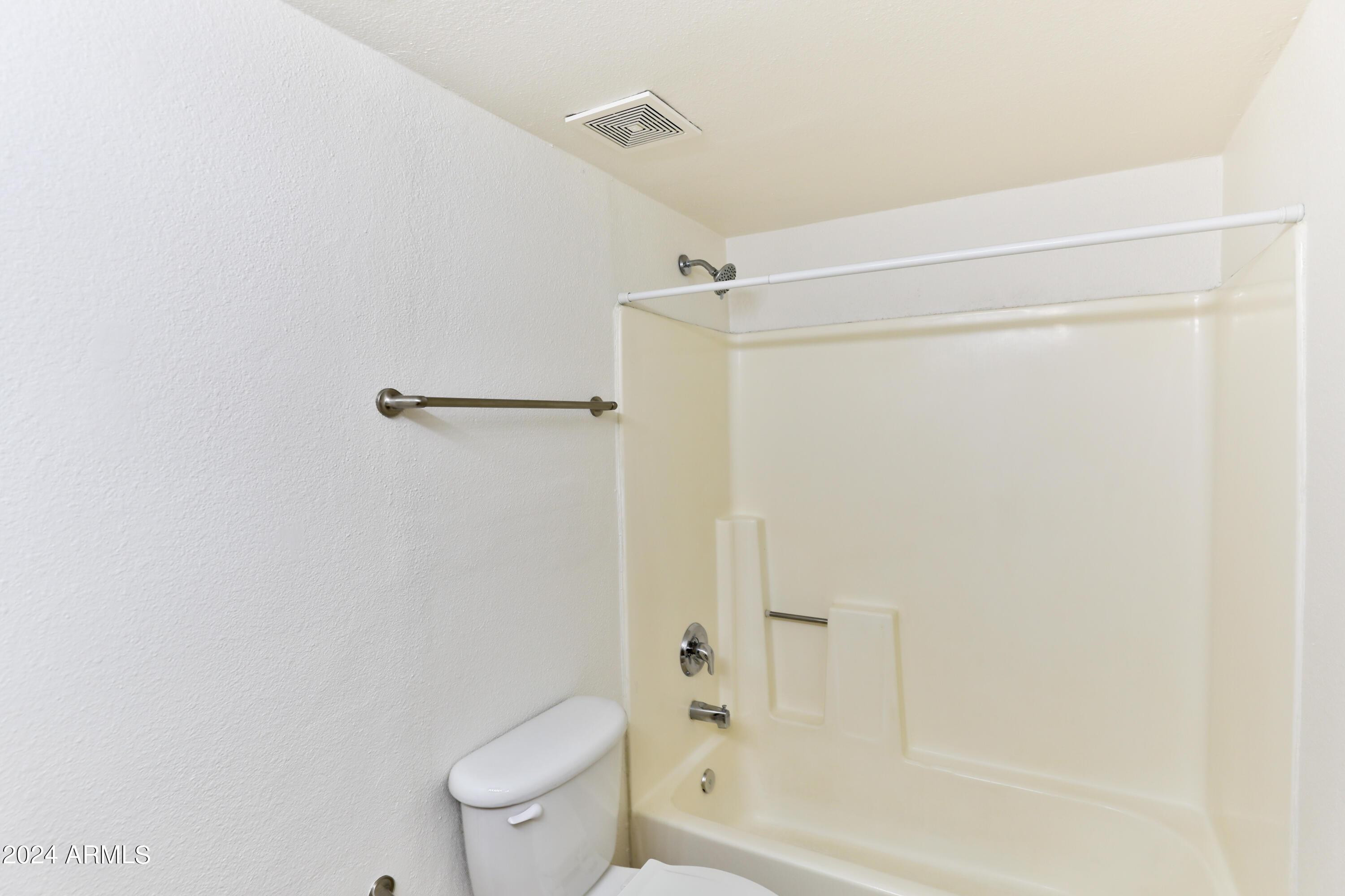 330 South Beck Avenue, Unit 201 Tempe, AZ 85281 - Photo 17 of 17 a bathroom with a shower and a toilet