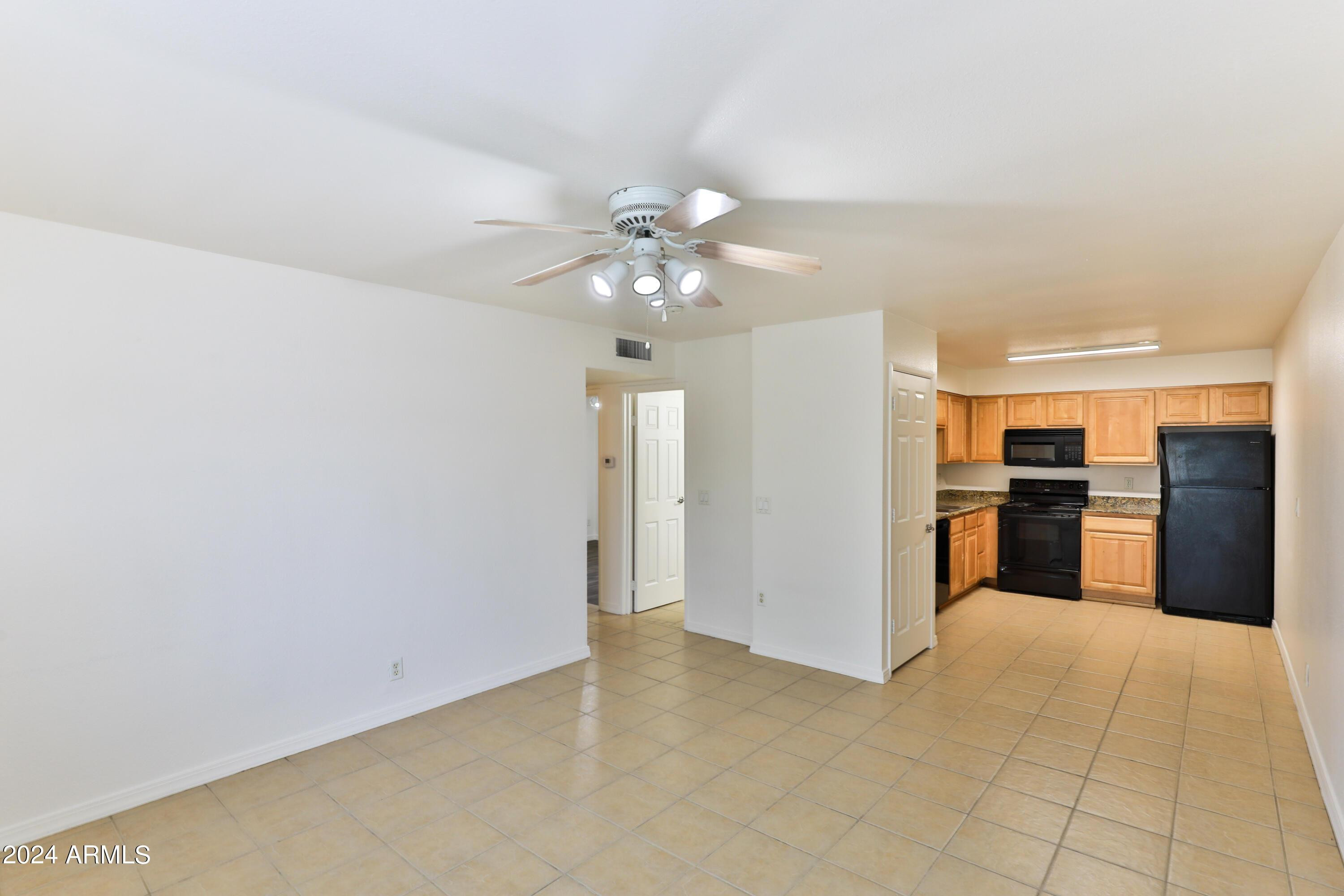 330 South Beck Avenue, Unit 201 Tempe, AZ 85281 - Photo 6 of 17 a view of a kitchen with a sink and a kitchen