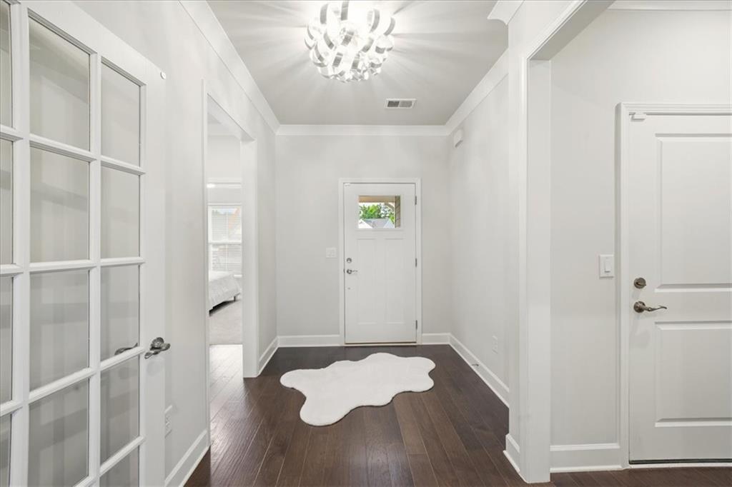 2457 Naples Street Hoschton, GA 30548 - Photo 25 of 41 a bathroom with a bathtub and shower