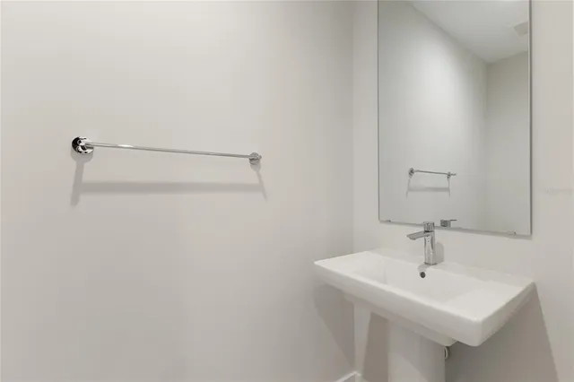 a room with lots of potted plants