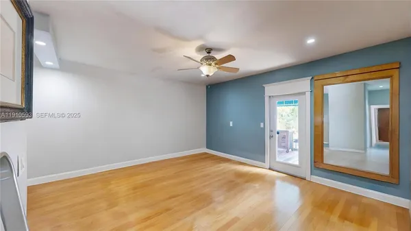 a workspace with furniture and wooden floor