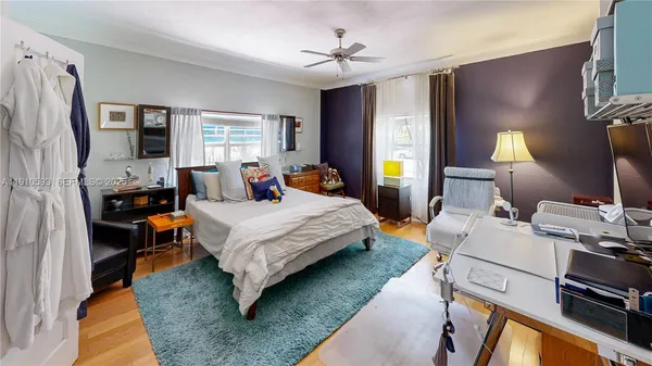 a room with furniture and a book shelf