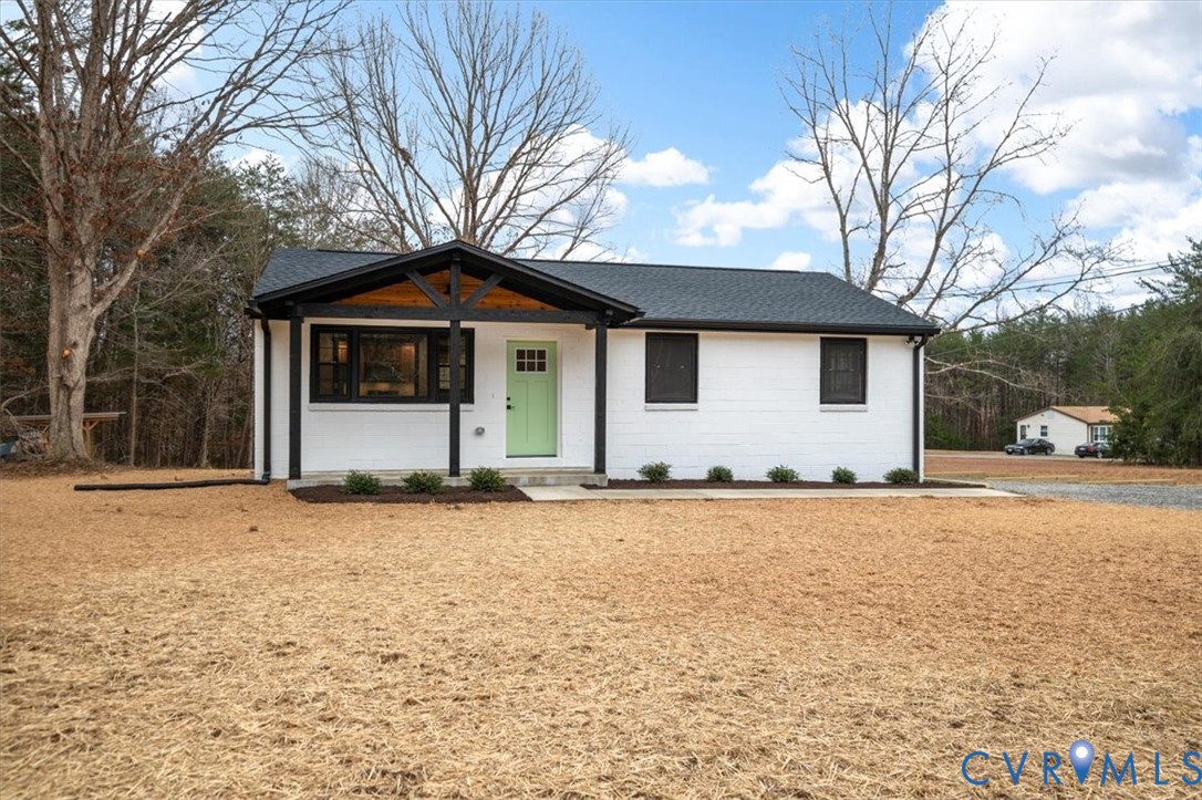 2495 Jackson Shop Road Goochland, VA 23063 - Photo 1 of 38 a front view of a house with a yard and garage