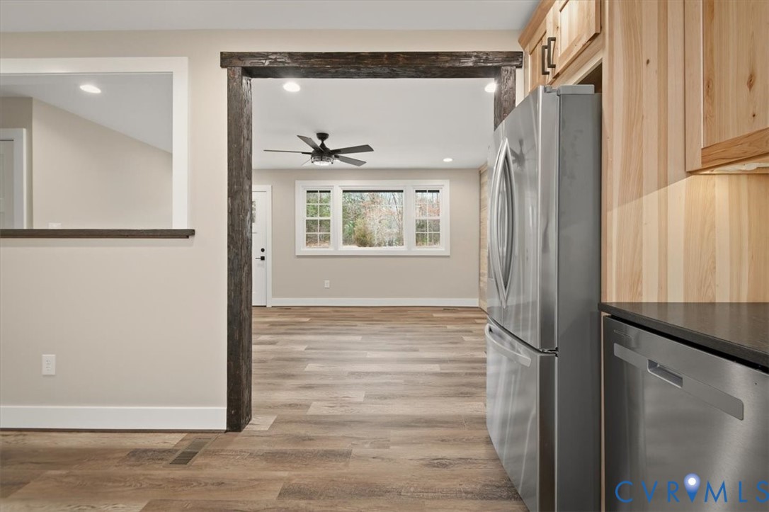 2495 Jackson Shop Road Goochland, VA 23063 - Photo 17 of 38 a view of a hallway with wooden floor and windows