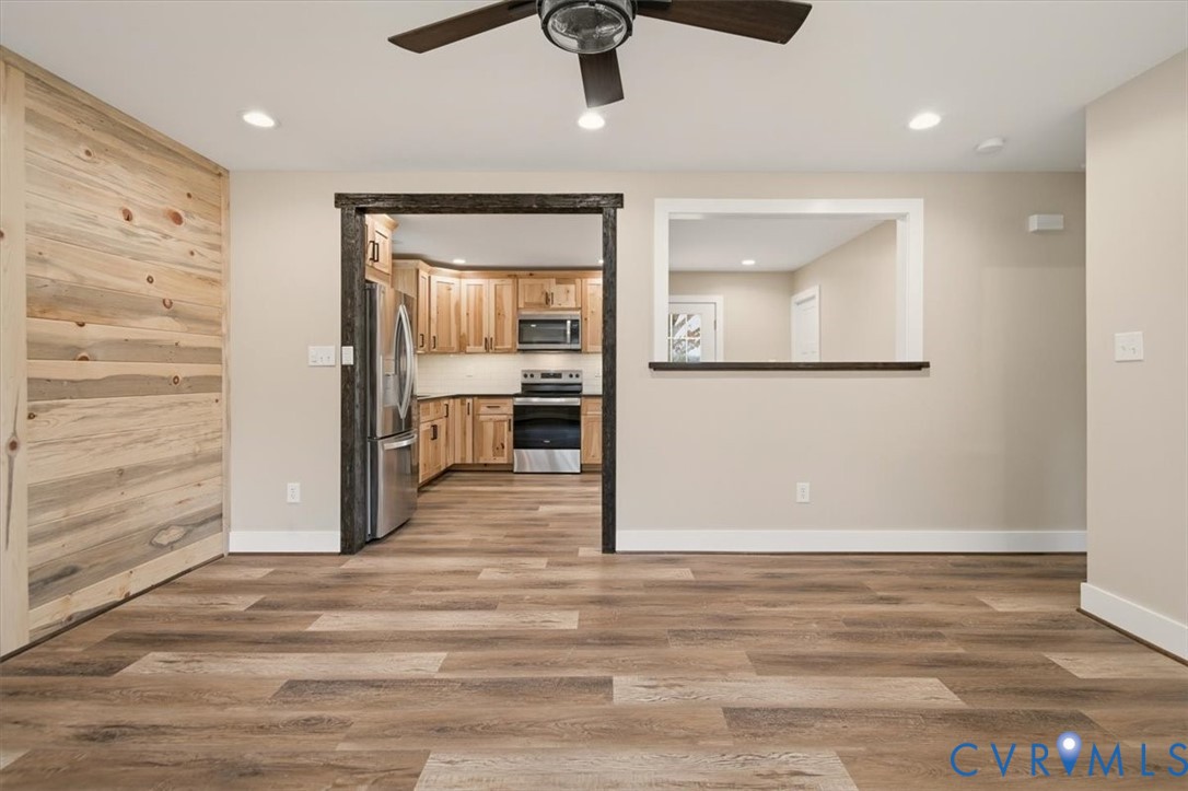 2495 Jackson Shop Road Goochland, VA 23063 - Photo 10 of 38 a view of a hallway with wooden floor