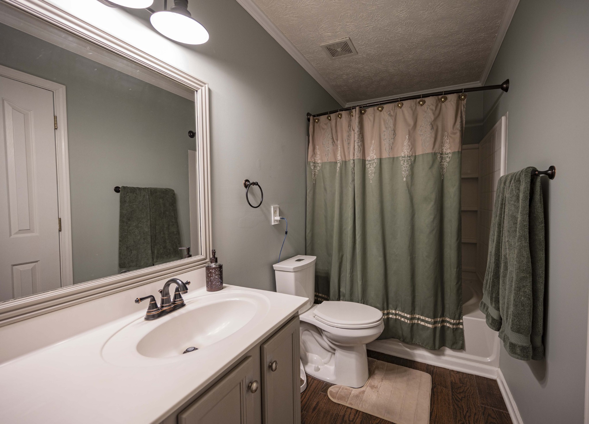1237 Macduff Drive Murfreesboro, TN 37128 - Photo 12 of 20 a bathroom with a sink toilet and shower