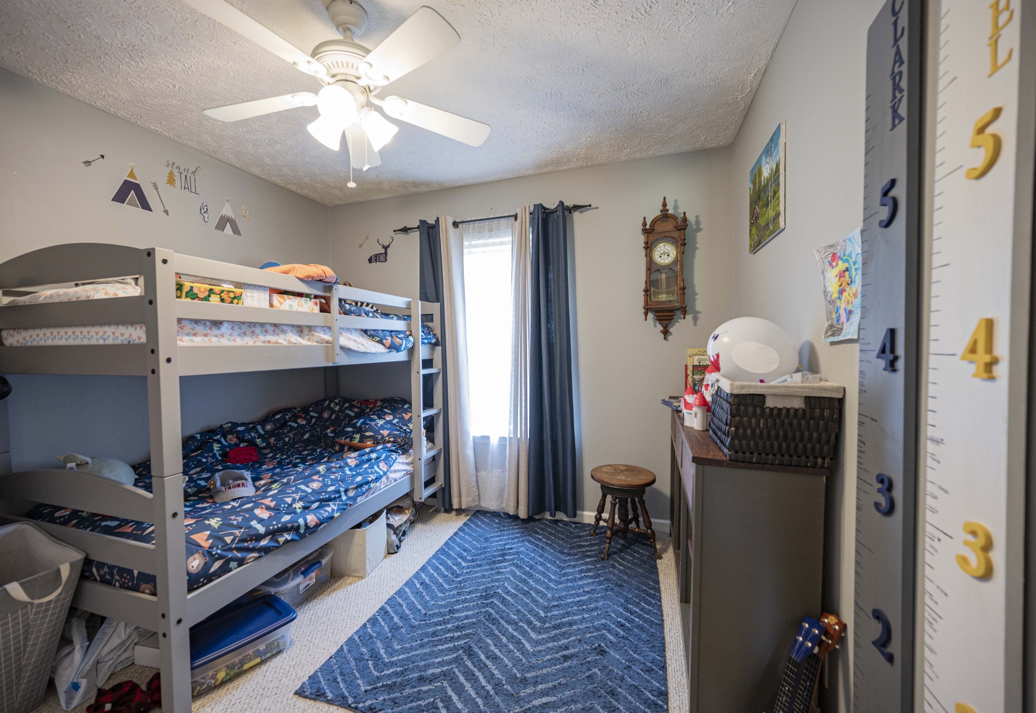 1237 Macduff Drive Murfreesboro, TN 37128 - Photo 13 of 20 a bedroom with a bed and a chandelier