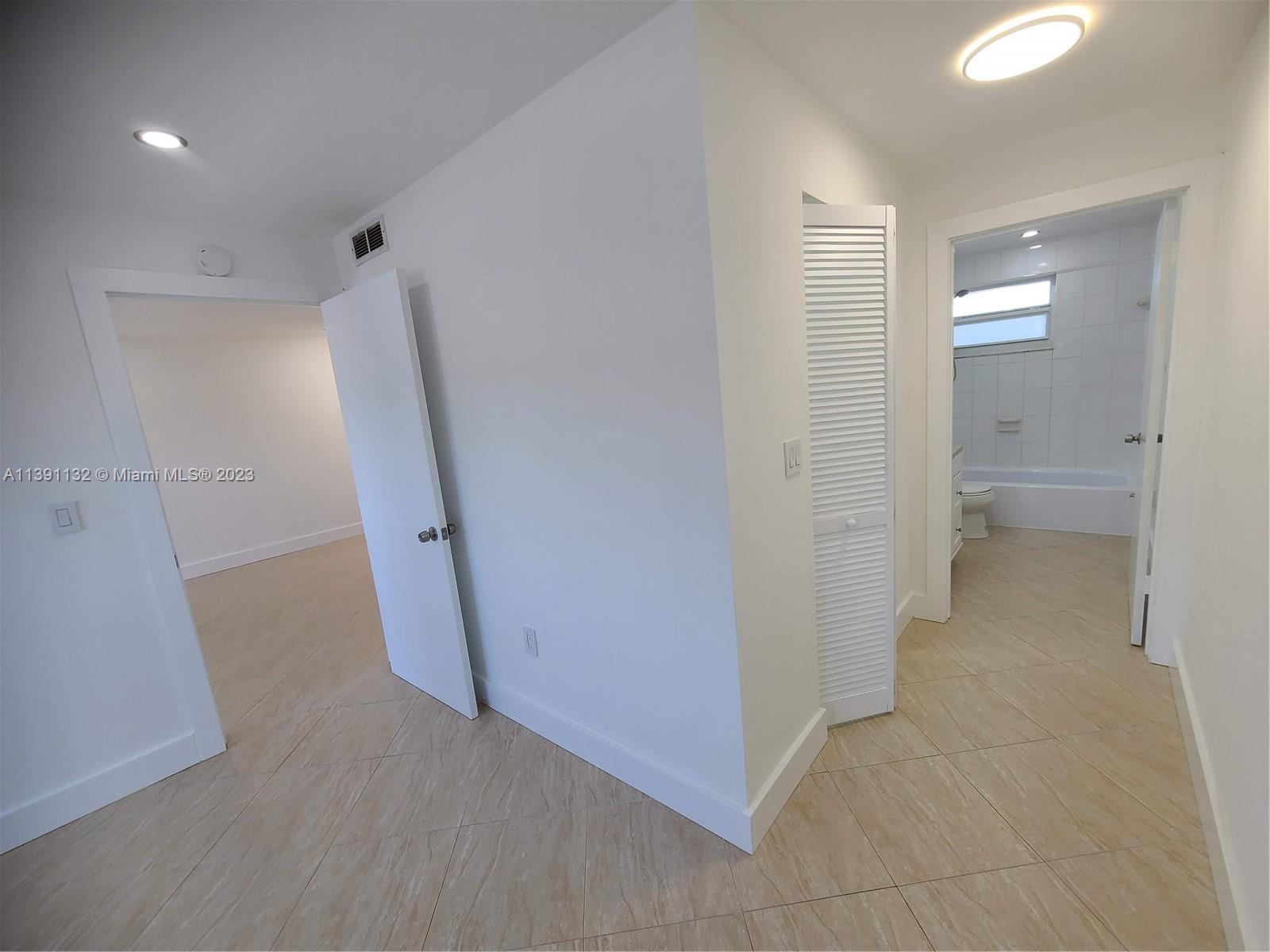 1612 Jefferson Avenue, Unit 403 Miami Beach, FL 33139 - Photo 33 of 55 a view of a hallway to rooms