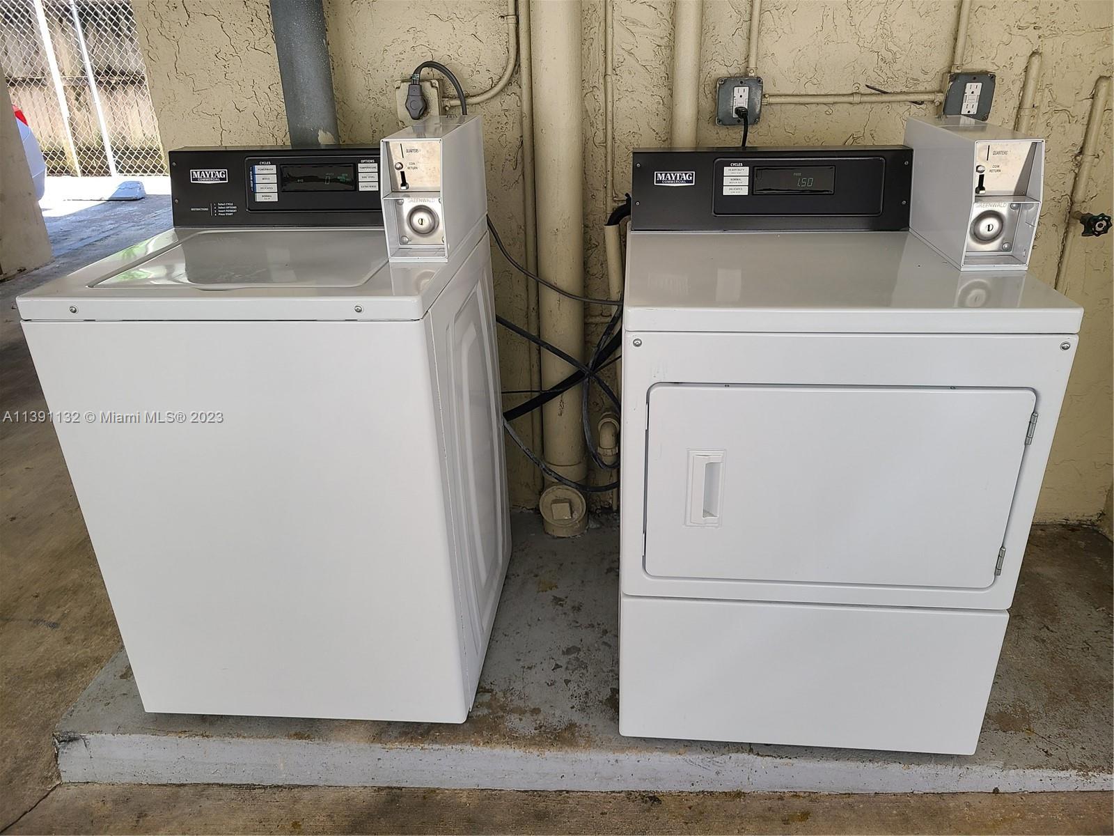 1612 Jefferson Avenue, Unit 403 Miami Beach, FL 33139 - Photo 48 of 55 a utility room with dryer and washer