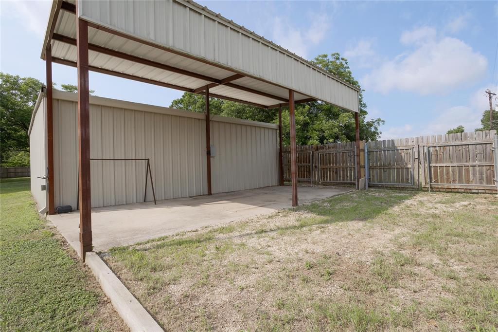 3999 Speegleville Road Waco, TX 76712 - Photo 27 of 34 12' X 30" Covered RV parking with 50 amp and 100 amp electrical service.