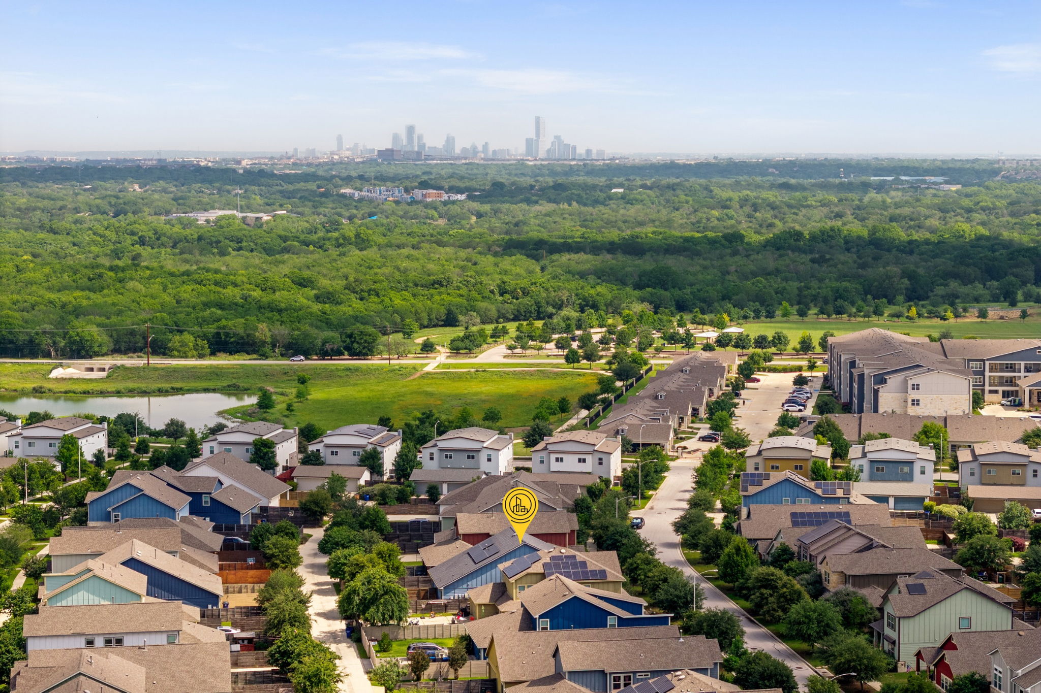 8800 Slater Drive Austin, TX 78747 - Photo 32 of 40 an aerial view of residential houses with outdoor space and lake view