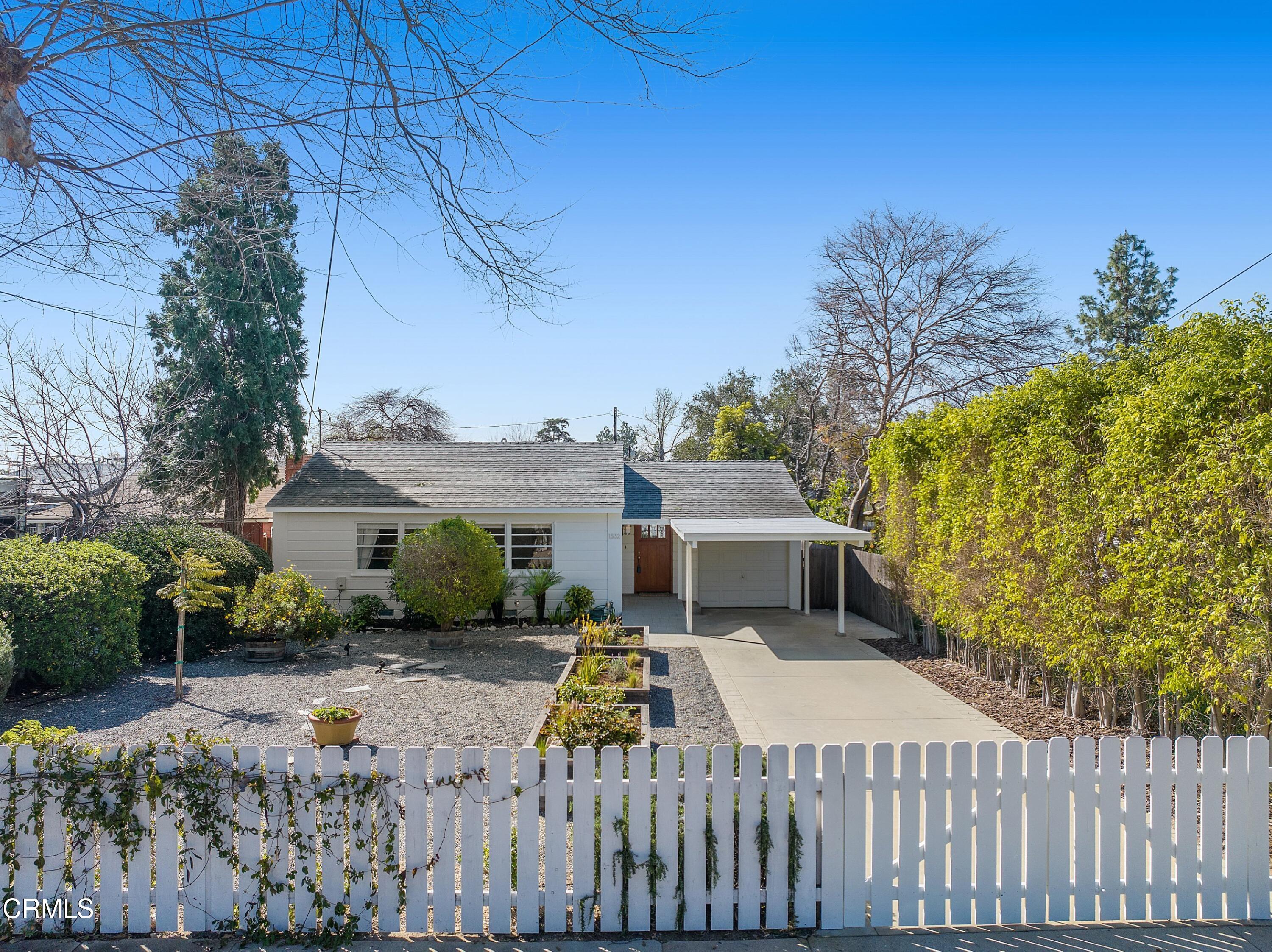 1532 Atchison Street Pasadena, CA 91104 - Photo 1 of 45 a view of a house with wooden fence