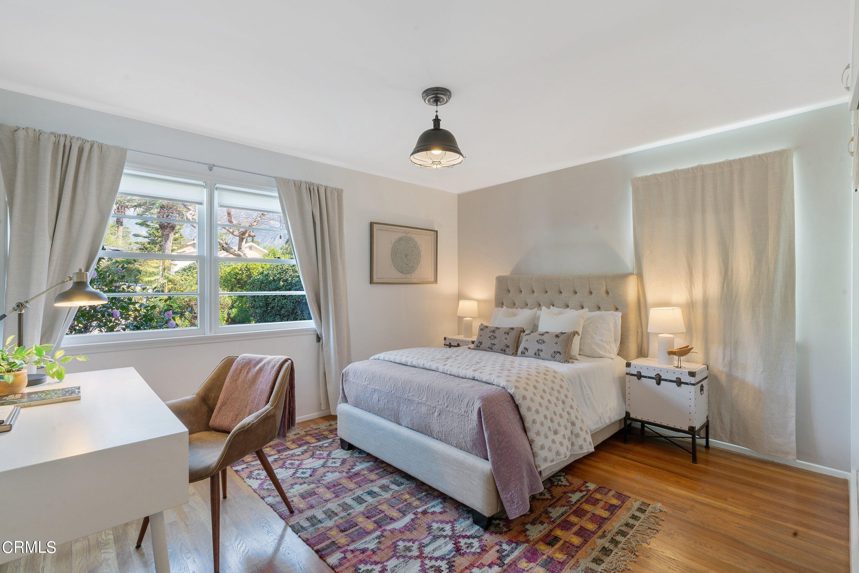 1532 Atchison Street Pasadena, CA 91104 - Photo 25 of 45 a bedroom with a bed and a window