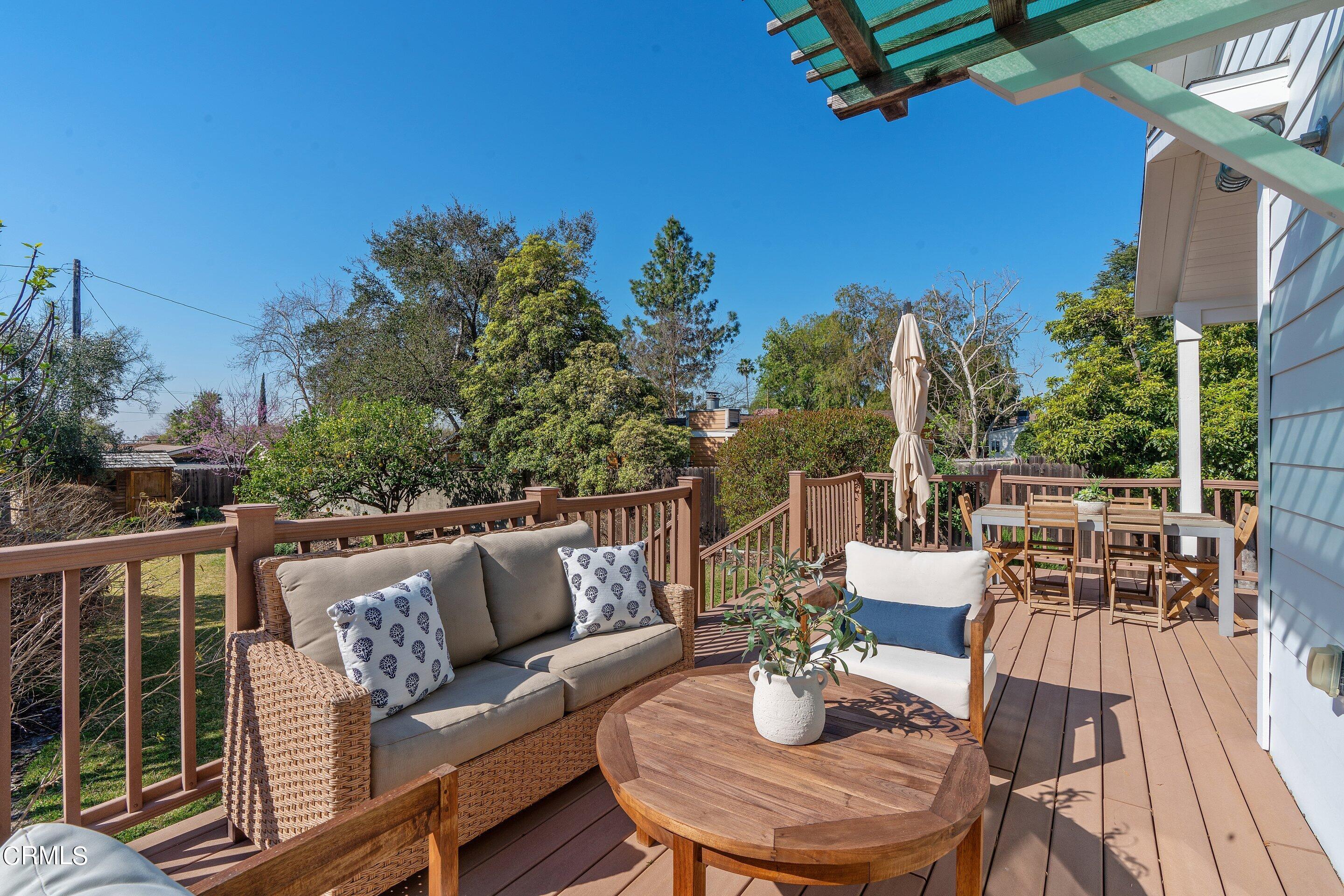 1532 Atchison Street Pasadena, CA 91104 - Photo 33 of 45 a view of a patio with couches table and chairs and potted plants