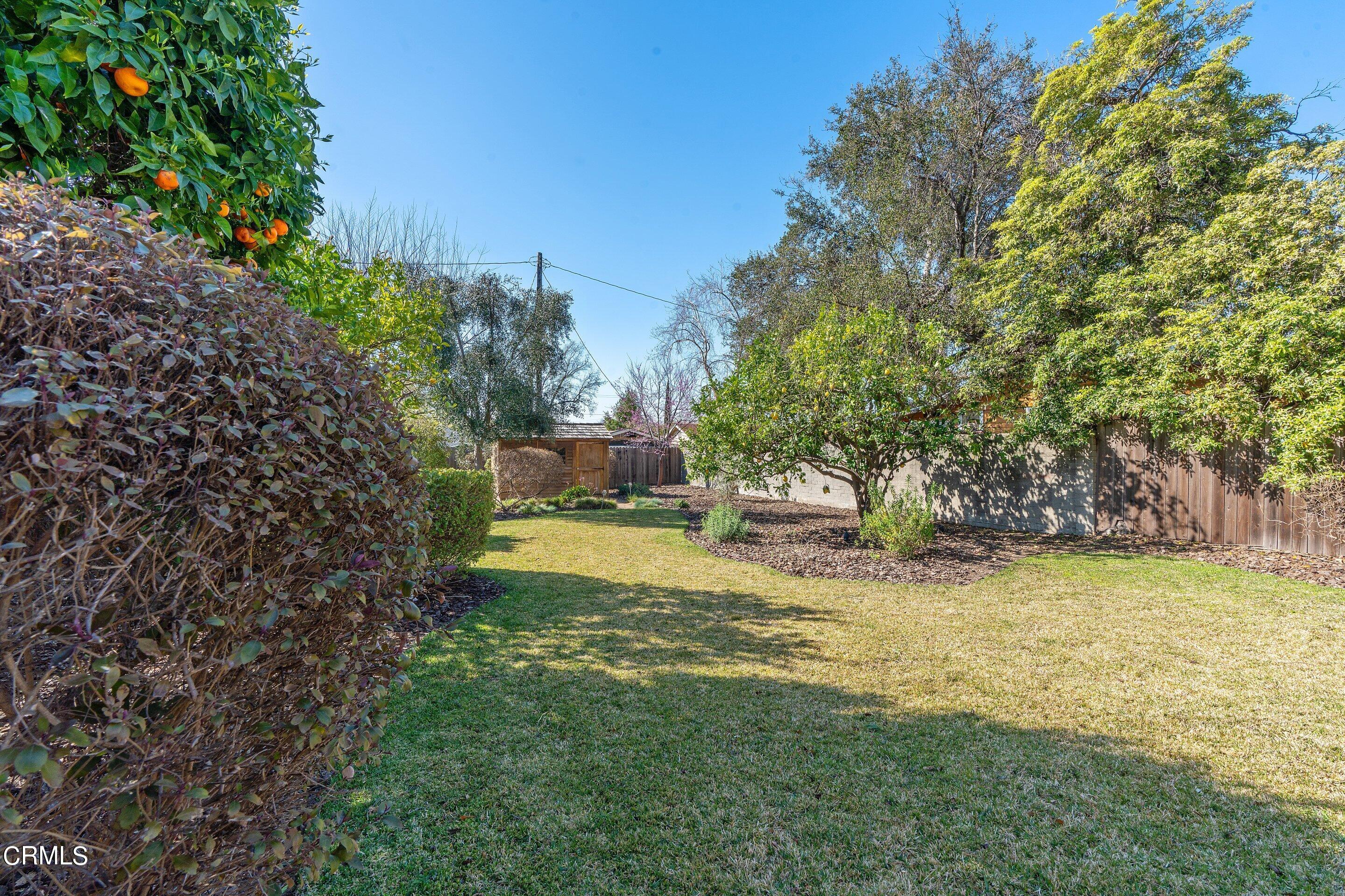 1532 Atchison Street Pasadena, CA 91104 - Photo 40 of 45 a view of a garden with a bench