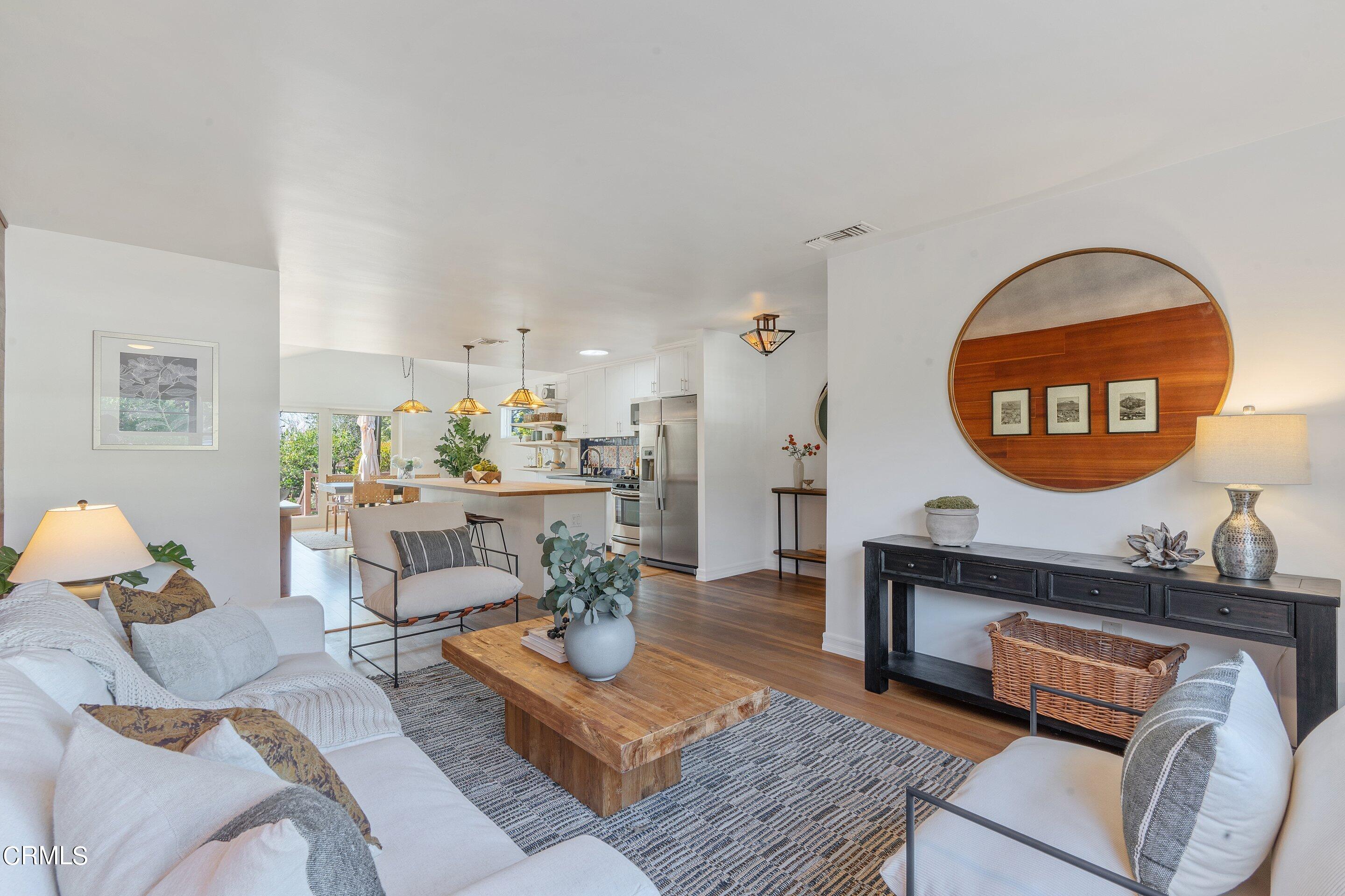 1532 Atchison Street Pasadena, CA 91104 - Photo 4 of 45 a living room with furniture and a wooden floor