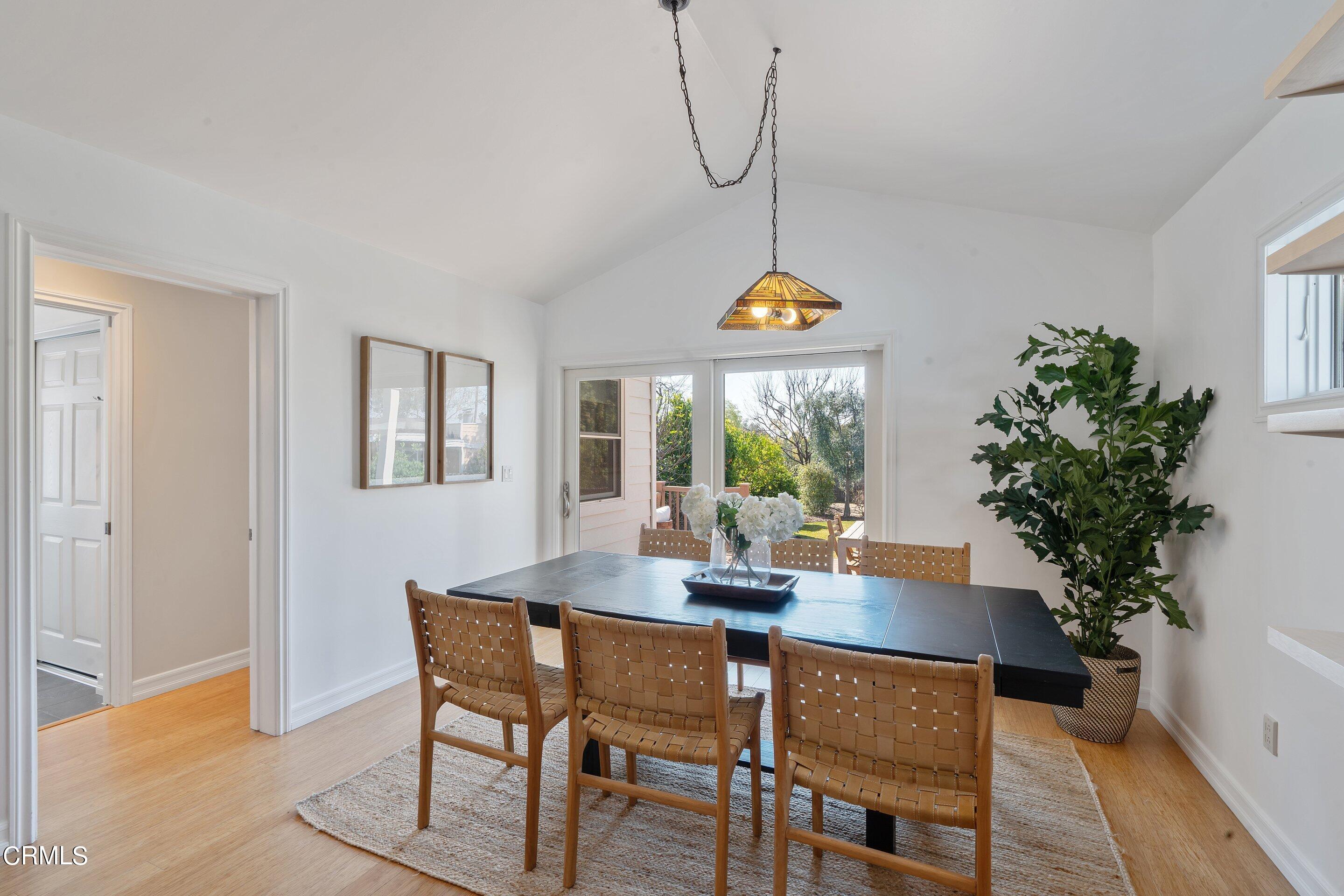 1532 Atchison Street Pasadena, CA 91104 - Photo 10 of 45 a view of a dining room with a table and chairs