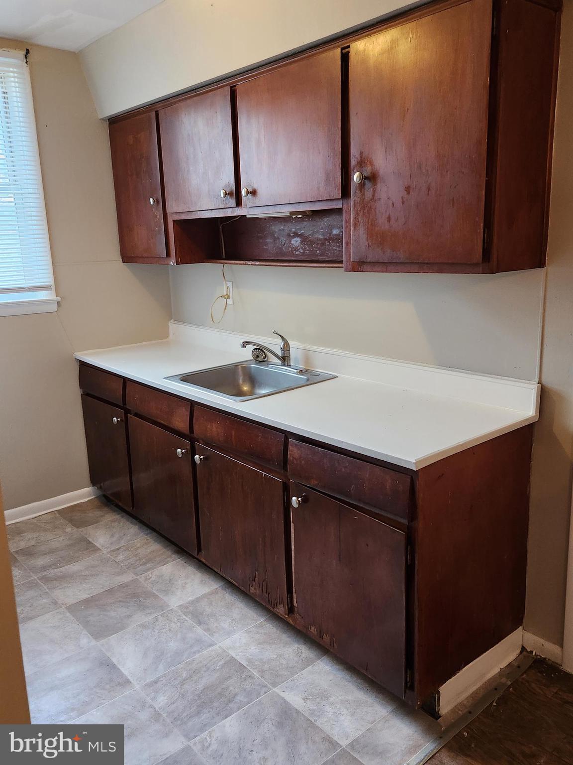 6651 Claridge Street Philadelphia, PA 19111 - Photo 12 of 26 a bathroom with a sink and a mirror