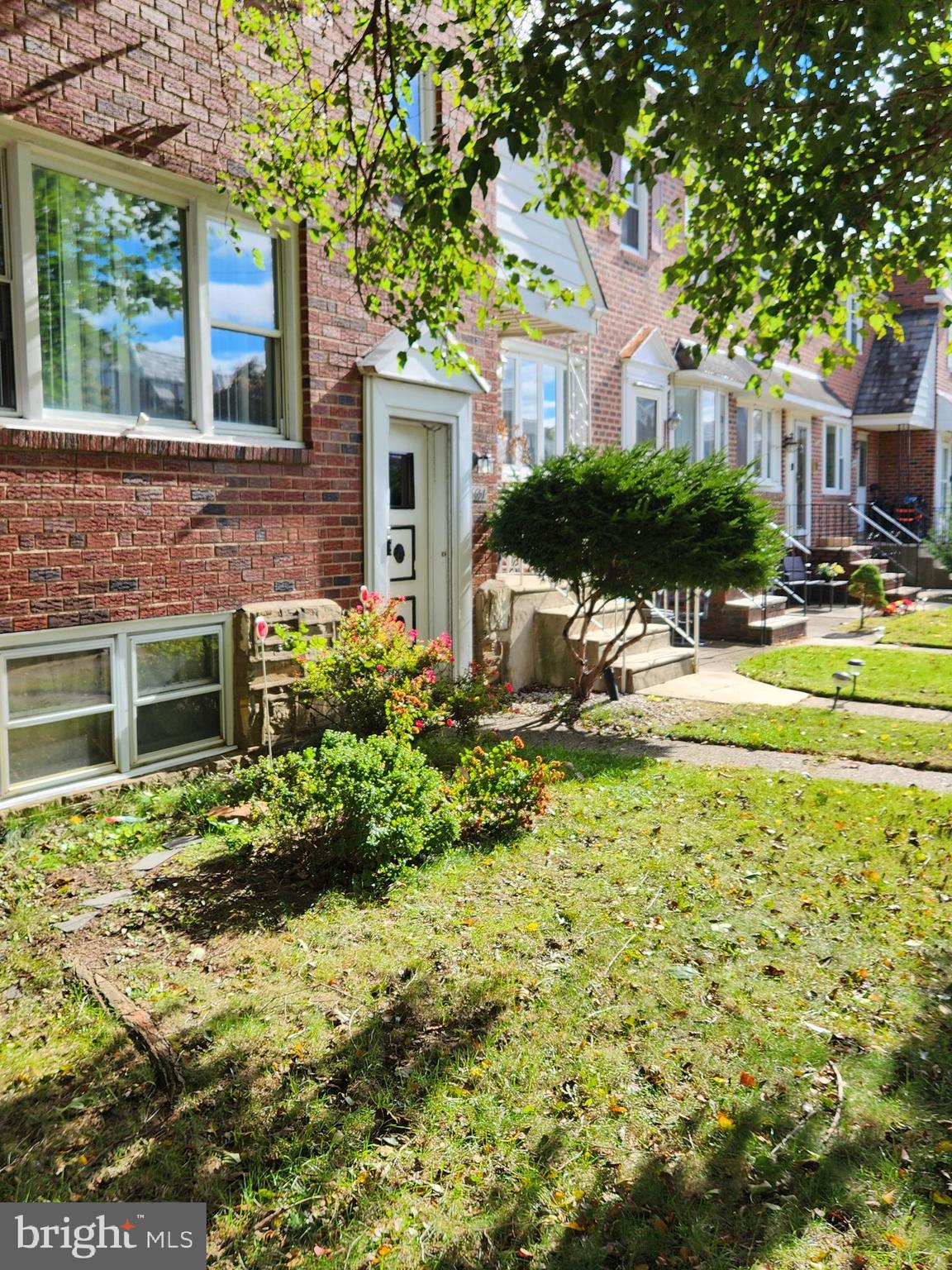 6651 Claridge Street Philadelphia, PA 19111 - Photo 2 of 26 a view of a house with a yard and plants