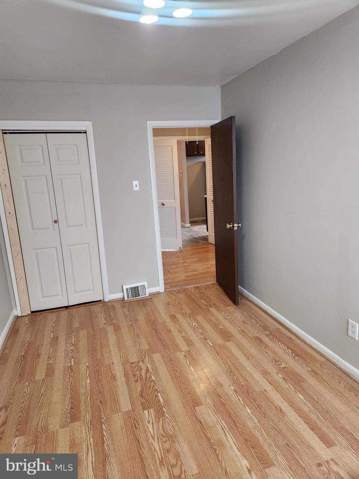 6651 Claridge Street Philadelphia, PA 19111 - Photo 22 of 26 a view of an empty room with wooden floor
