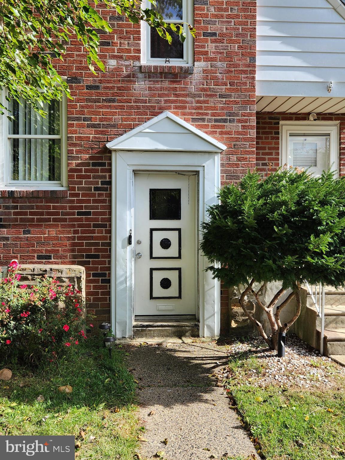 6651 Claridge Street Philadelphia, PA 19111 - Photo 3 of 26 a front view of a house with a yard