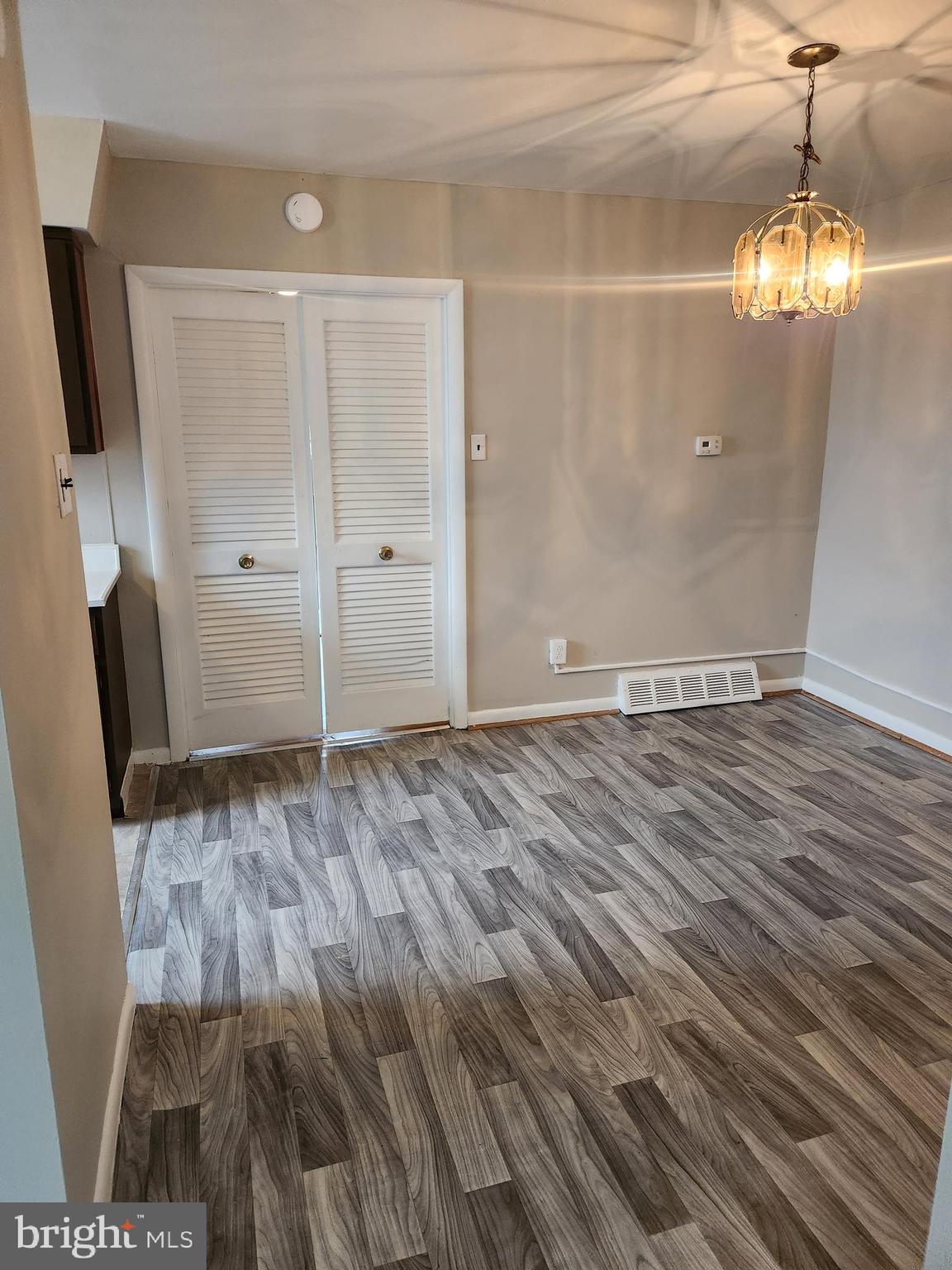 6651 Claridge Street Philadelphia, PA 19111 - Photo 6 of 26 a view of a livingroom with wooden floor and window